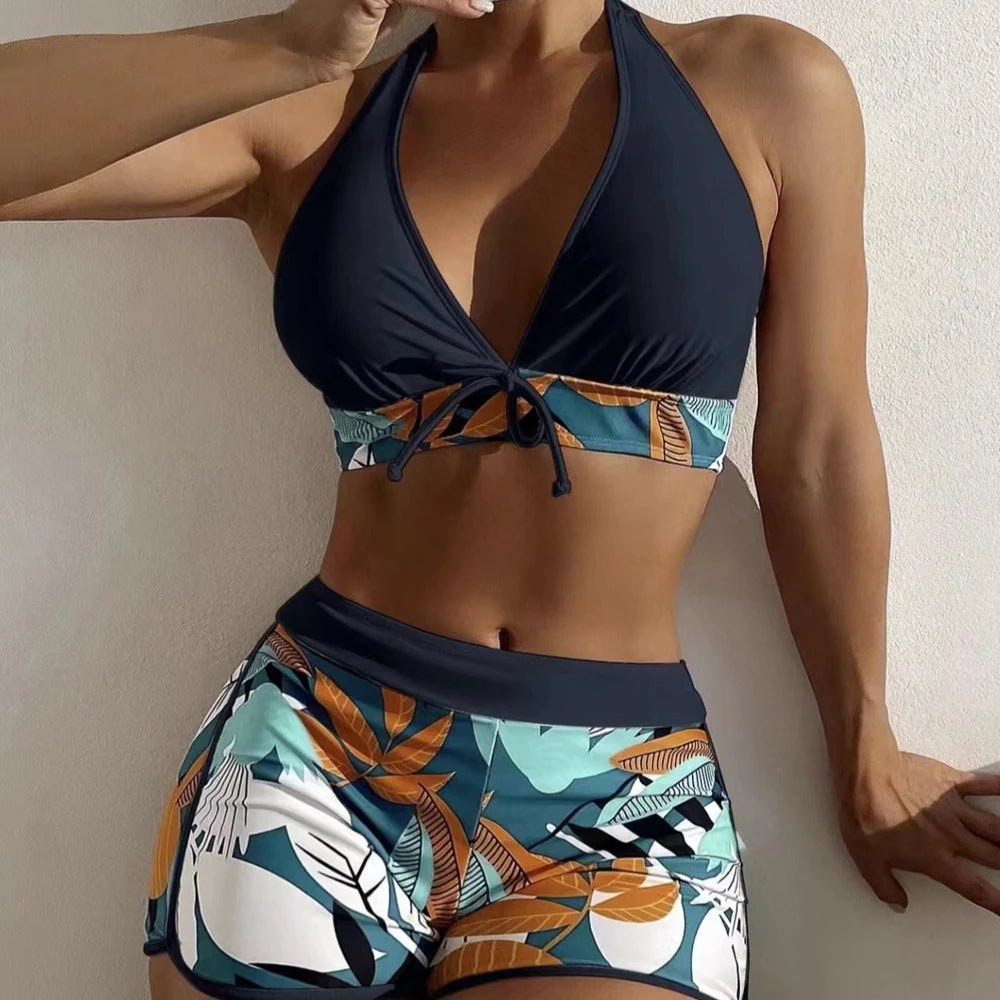 Bikini deportivo de 2 piezas con top halter y short alto estampado tropical