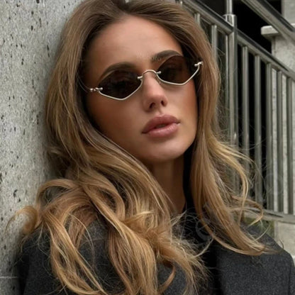 Gafas de sol cat eye con montura dorada