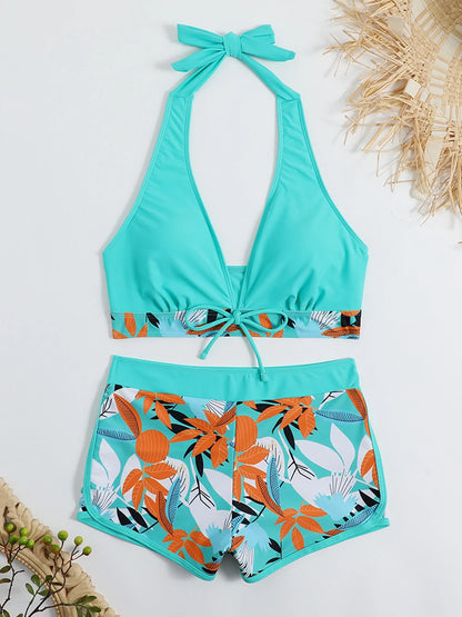 Bikini deportivo de 2 piezas con top halter y short alto estampado tropical