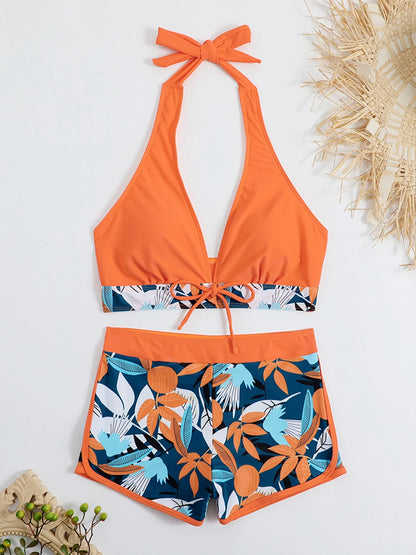 Bikini deportivo de 2 piezas con top halter y short alto estampado tropical
