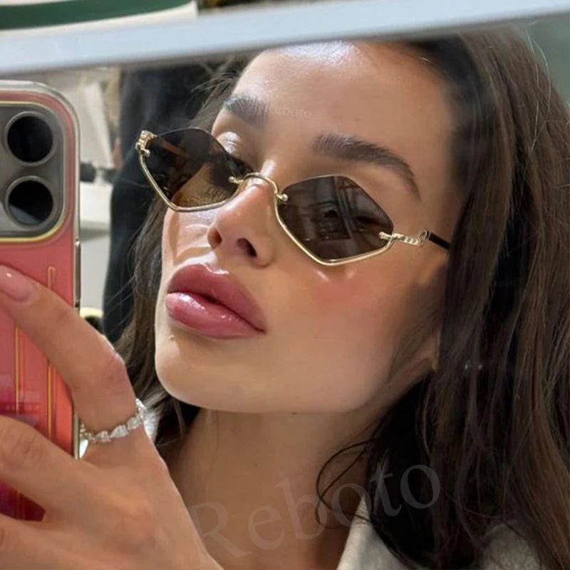 Gafas de sol cat eye con montura dorada