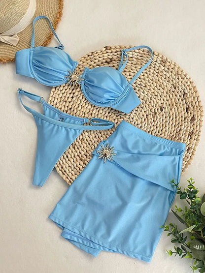Bikini azul con aro y falda