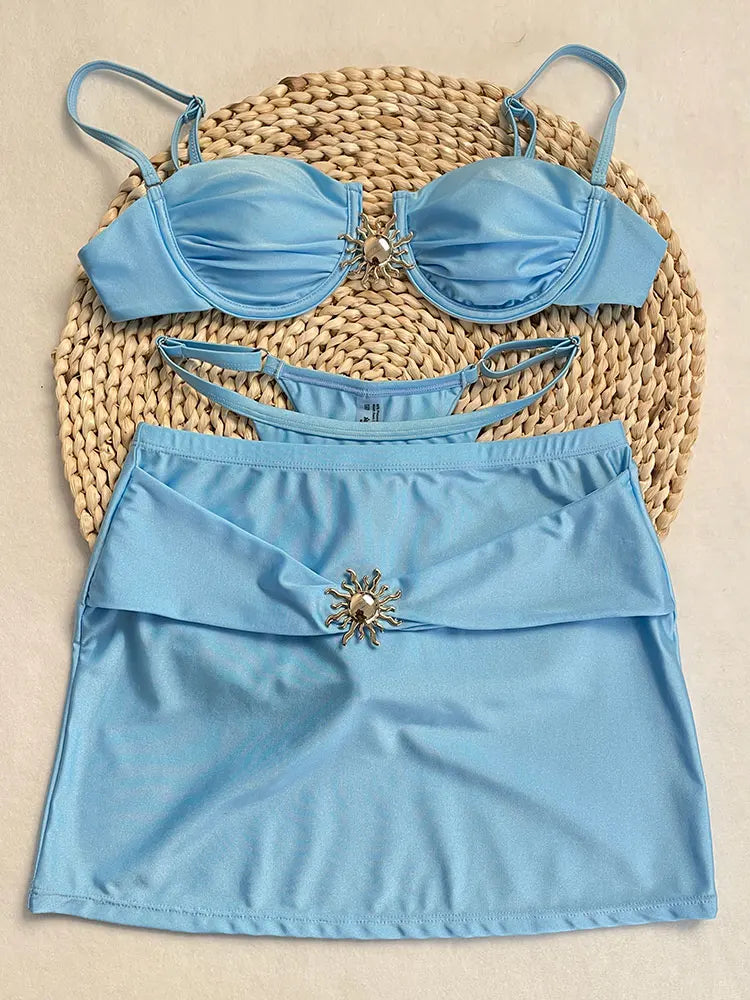 Bikini azul con aro y falda