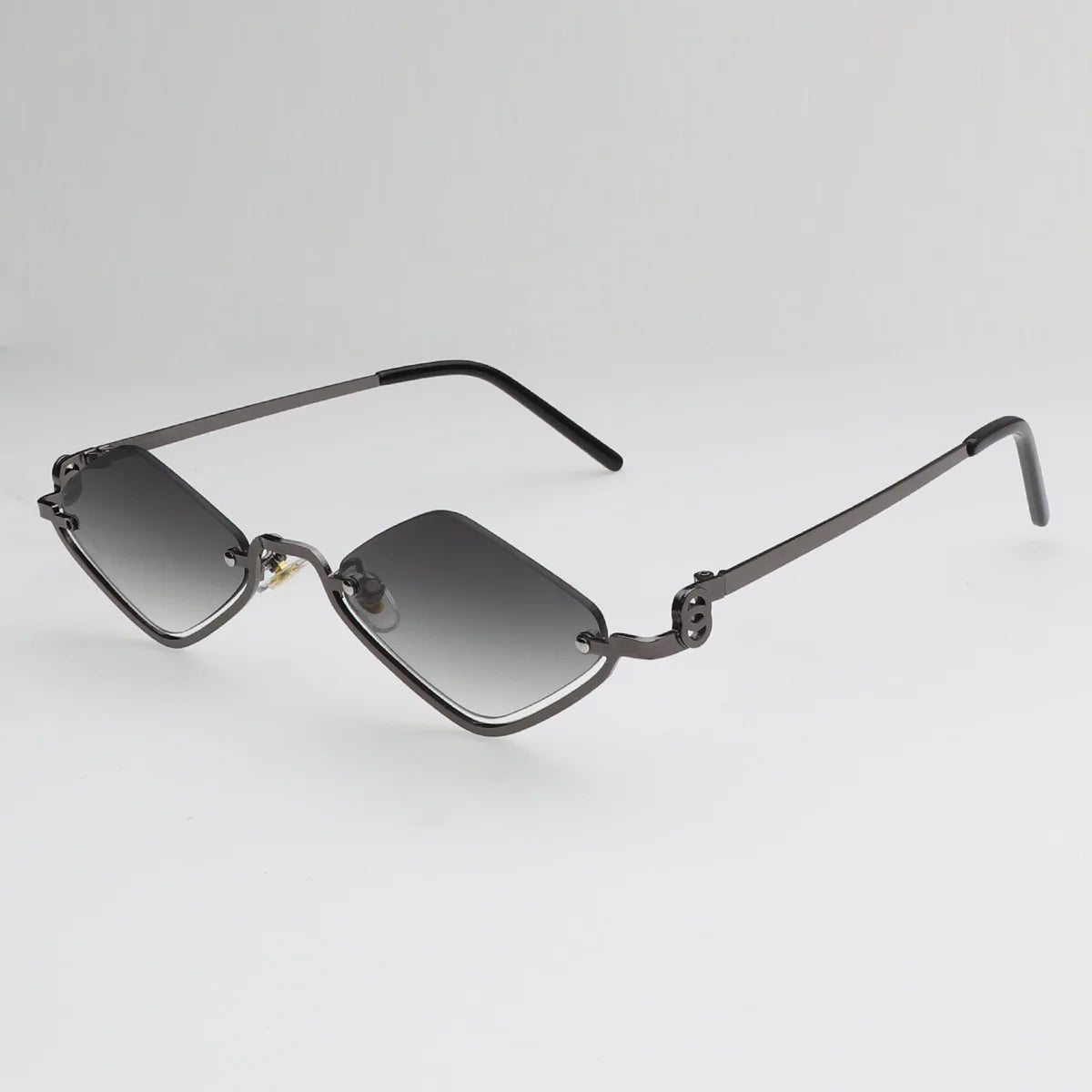 Gafas de sol cat eye con montura dorada