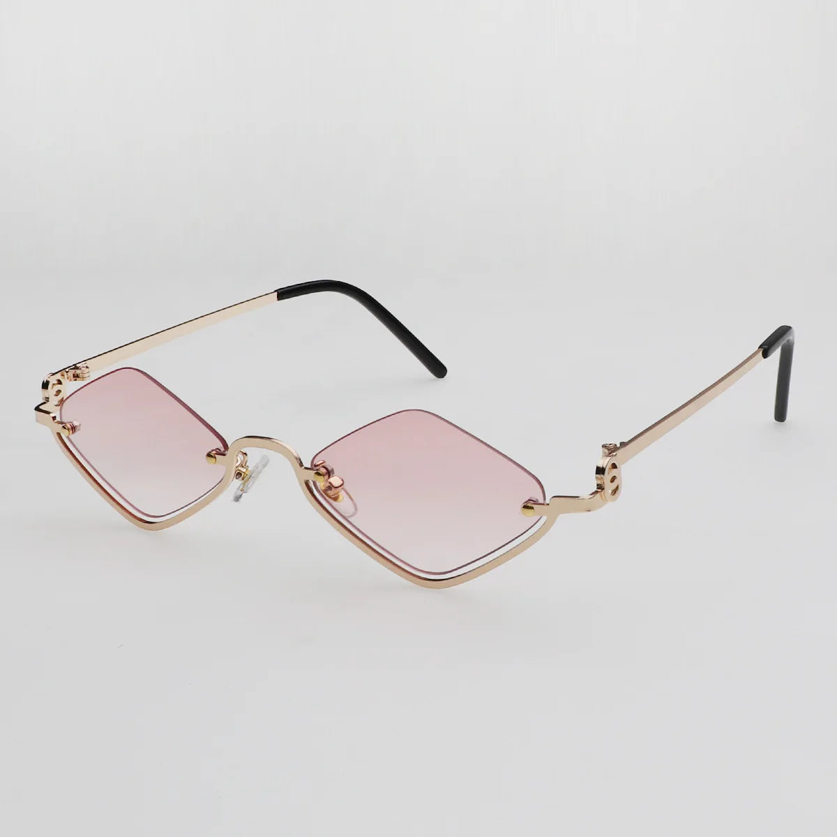 Gafas de sol cat eye con montura dorada
