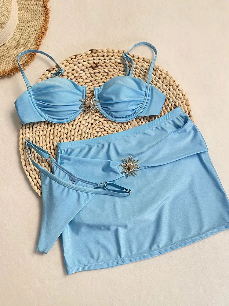 Bikini azul con aro y falda