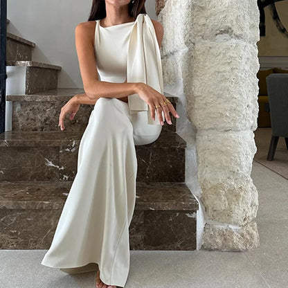 Vestido largo blanco asimétrico con lazo en hombro