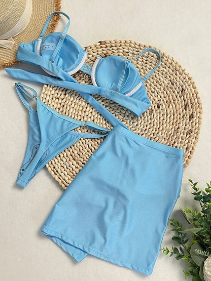 Bikini azul con aro y falda