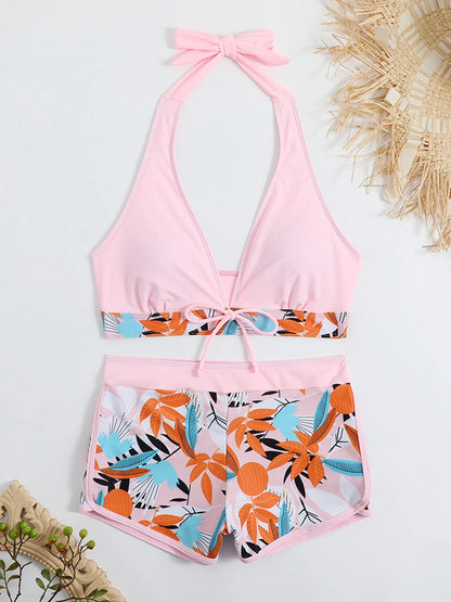Bikini deportivo de 2 piezas con top halter y short alto estampado tropical