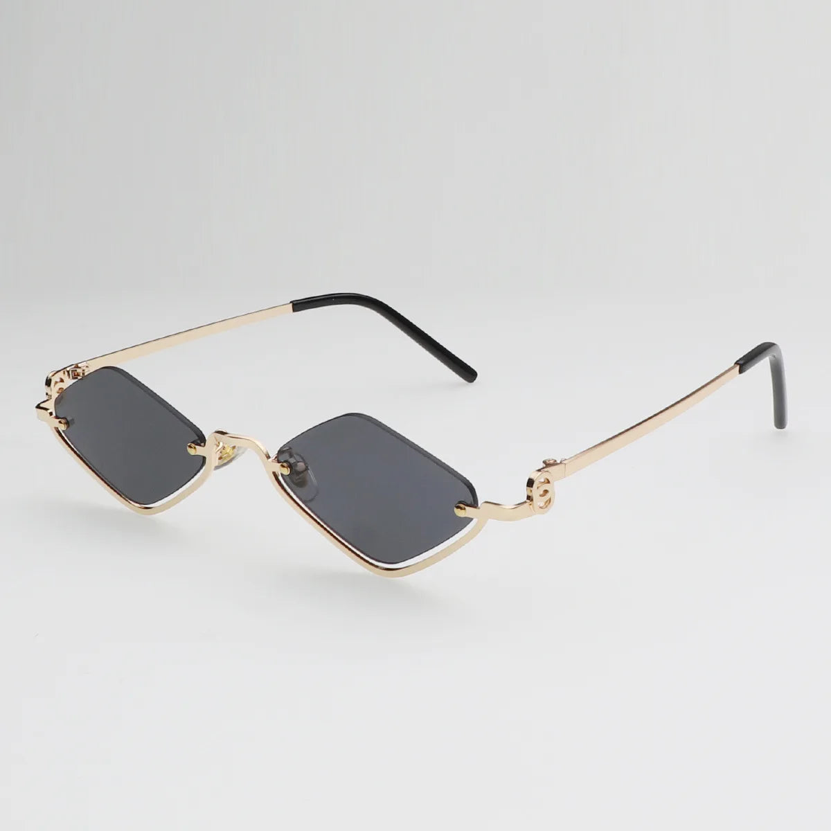 Gafas de sol cat eye con montura dorada