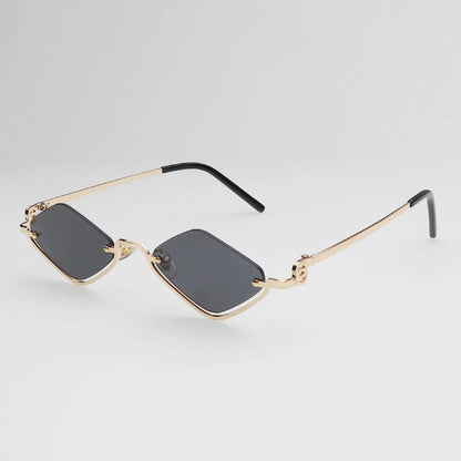 Gafas de sol cat eye con montura dorada