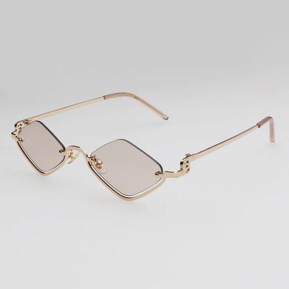 Gafas de sol cat eye con montura dorada