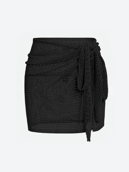 Falda corta con nudo lateral estilo playero chic y moderno