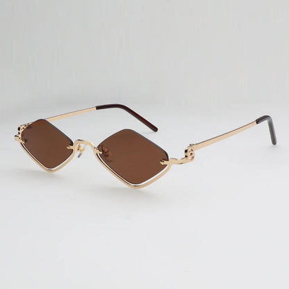 Gafas de sol cat eye con montura dorada