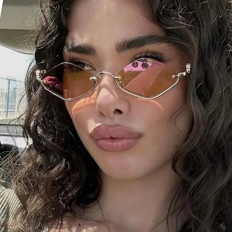 Gafas de sol cat eye con montura dorada