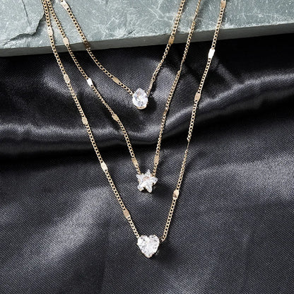 Collar dorado triple con circonias