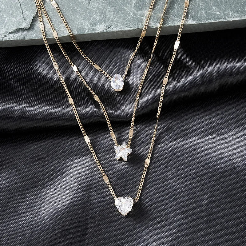 Collar dorado triple con circonias