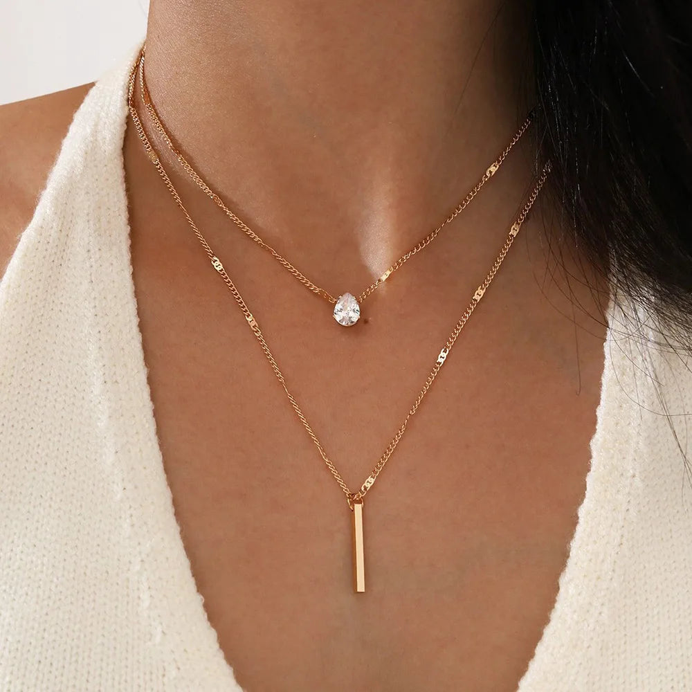 Collar dorado triple con circonias