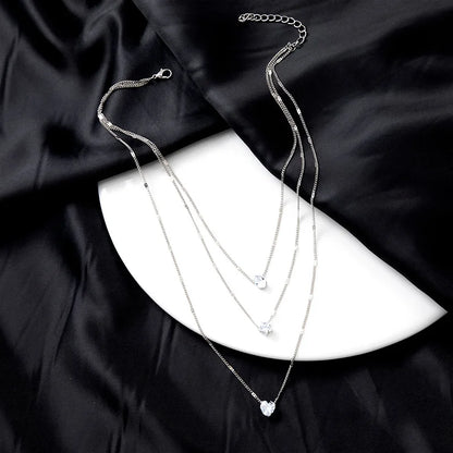 Collar dorado triple con circonias