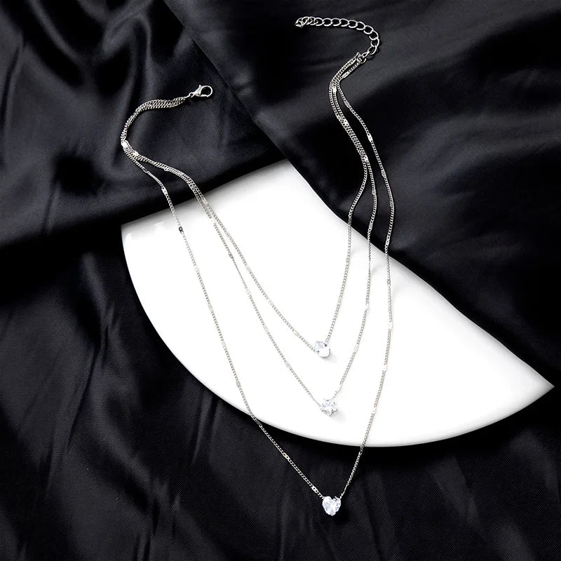 Collar dorado triple con circonias