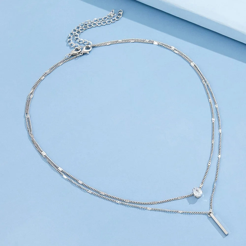 Collar dorado triple con circonias