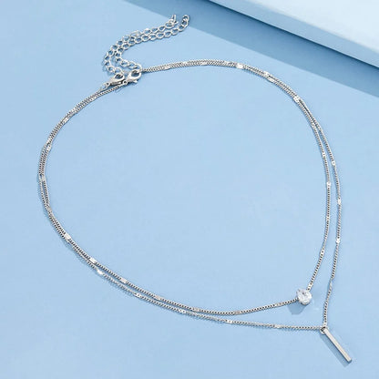 Collar dorado triple con circonias