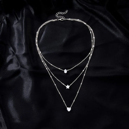 Collar dorado triple con circonias