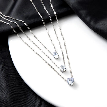 Collar dorado triple con circonias